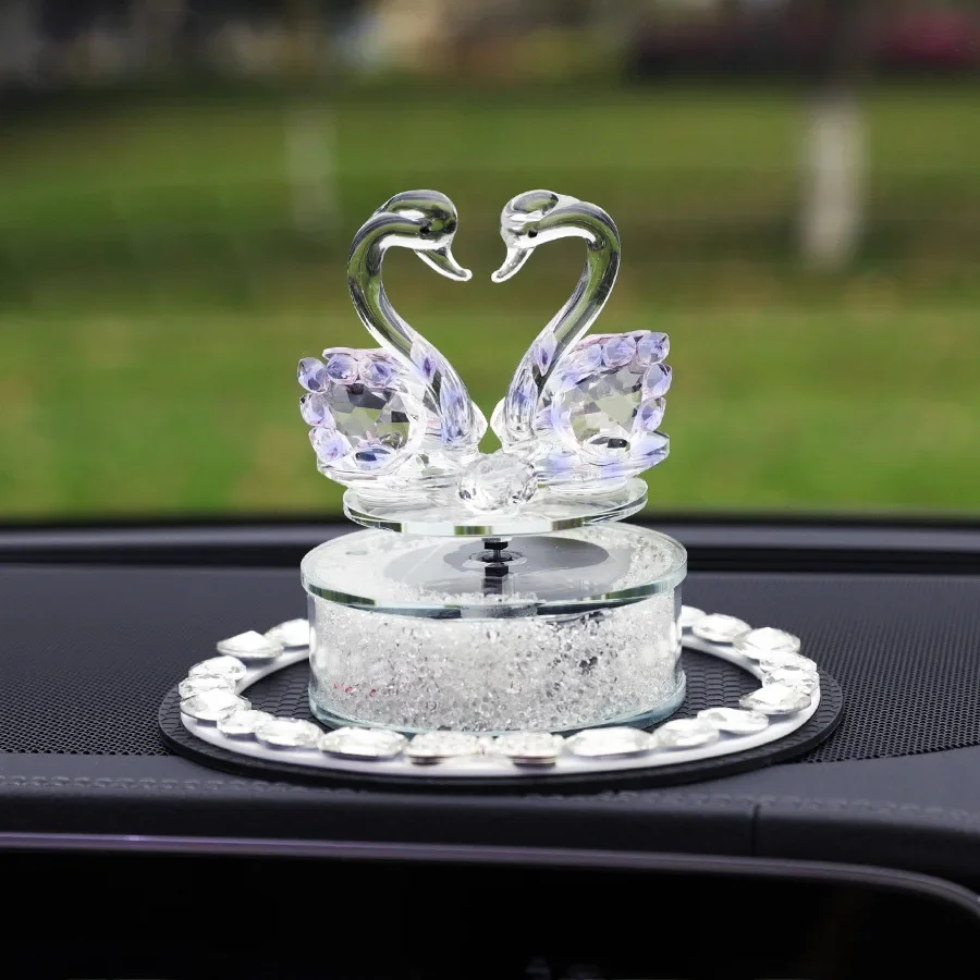 thumbnail image 1 of Ambientador de coche de lujo con forma de cisne de cristal giratorio y alimentado por energía solar, para decoración de interiores, perfume ligero para automóvil, 1 of 5