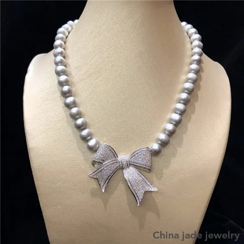 

Hand knotted natural 9-10mm nearl round fresh water gray pearl temperament micro inlay zircon bowknot necklace fashion jewelry