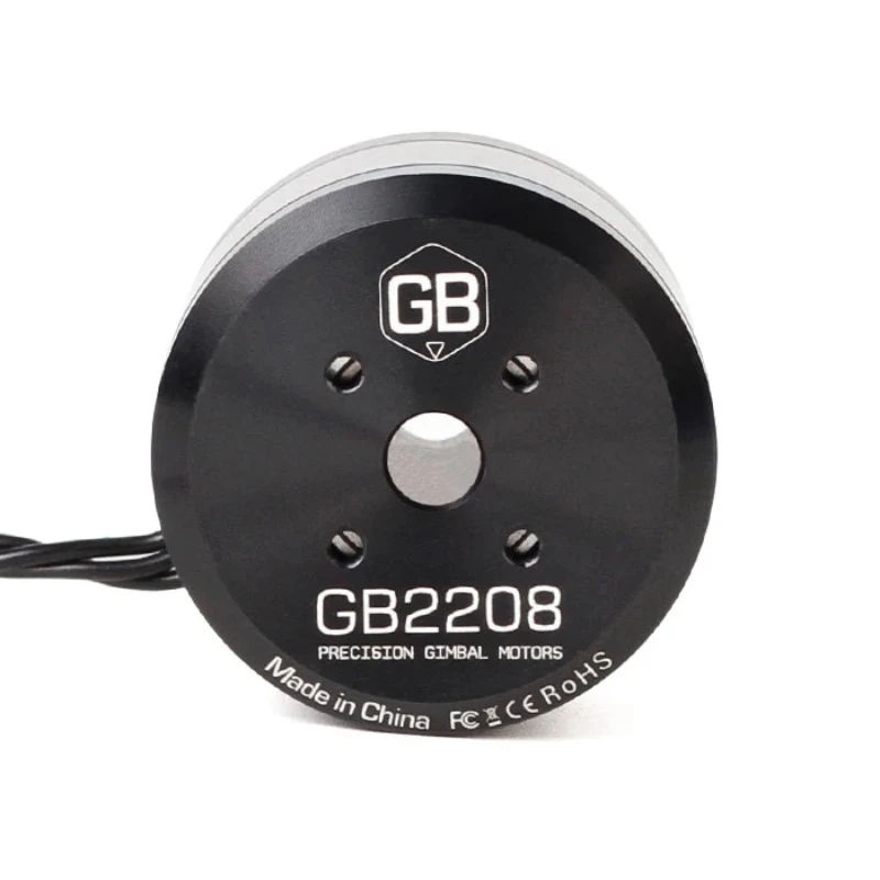 Moteur à cardan T GB2208 KV128 sans balais pour photographie aérienne, posé sur une surface blanche, entouré de câbles.