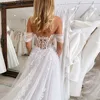 2025 Graceful A Line Women's Wedding Dresses Sexy Off The Shoulder Customized Bride Gowns Lace Appliques Backless Robe De Mariée 4