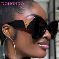 2025 nouvelle mode grand cadre oeil de chat papillon femmes lunettes de soleil de luxe concepteur hommes lunettes de soleil en plein air voyage lunettes femme UV400 1