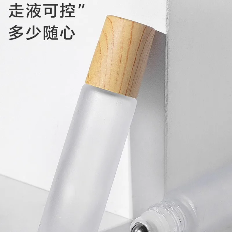 200pcs High Quality 5ml 10ml clear Roller Ball Matte Glass Roll on Bottle with Wood Bamboo Lid 5