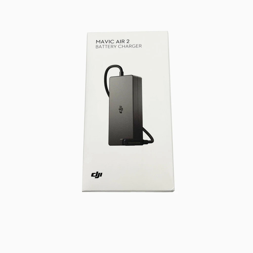Vue de dessus du chargeur batterie drone DJI portable, ports USB-C et indicateur de puissance, finition mate.