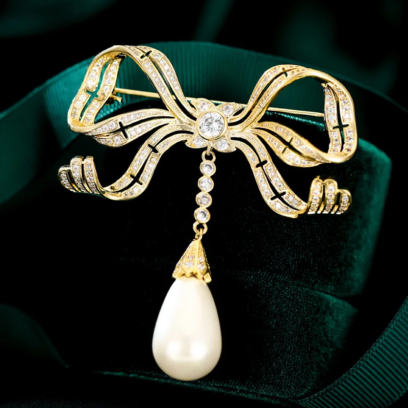 

Нежная циркониевая уникальная брошь в форме банта AAA, булавка для женских аксессуаров, элегантная булавка из искусственного жемчуга и меди, ...