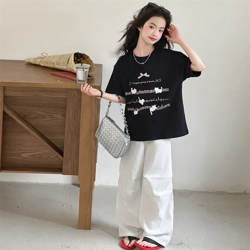 Kinderkleidung Mädchen Sommer 2026 Süßes Niedliches Cartoon-Print Kurzarm-T-Shirt und Weiße Weite Cargo-Hose