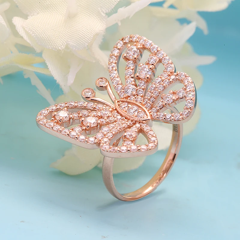 18 Karat Rose Gold Butterfly Ring with Diamonds – Welcome – Amwaj