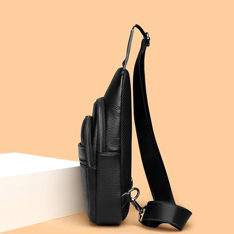 Stylish genuine leather sling bag for men with multiple compartments, ideal for everyday carry or travel