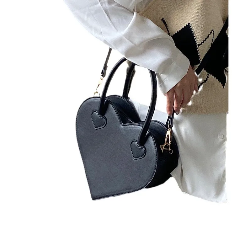 Cute and simple heart-shaped printed women's backpack, fashionable small crossbody bag, retro black single shoulder handbag