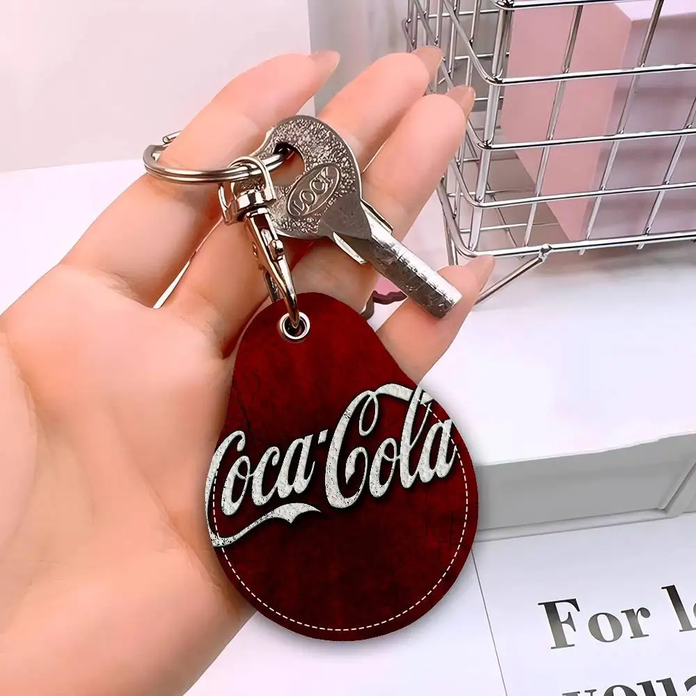 C-Coca-Cola Männer und Frauen Universal Rostschutz Schlüsselanhänger PU Leder Zugang Kartenhalter Drop Schlüsselanhänger Ring – Detail 15