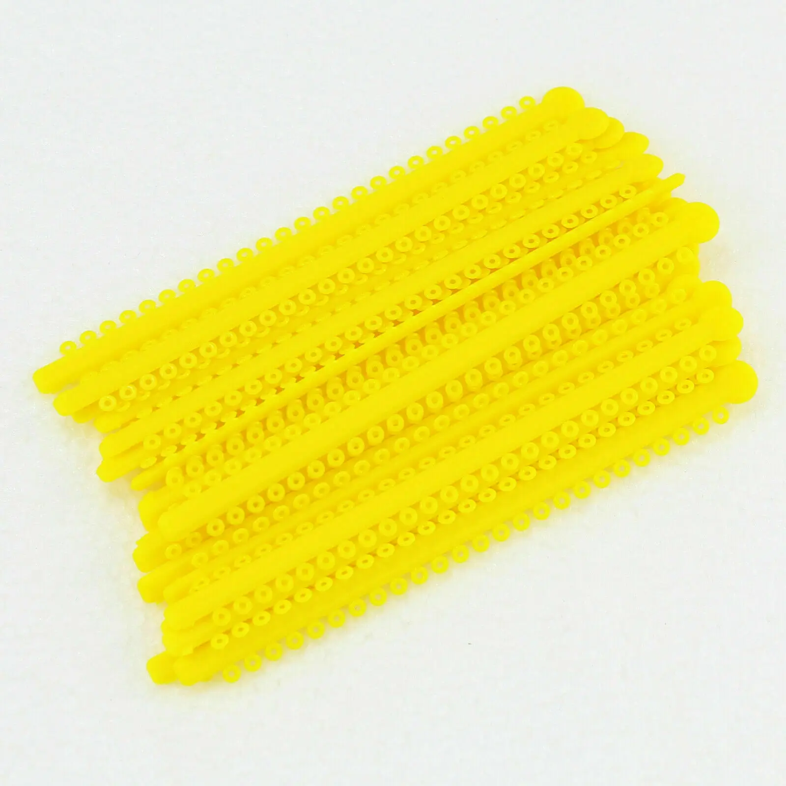 

Dental Ortho Elastomeric Ligature Ties Elastic Rubber Bands Braces Light Force yellow 20 sticks/pack