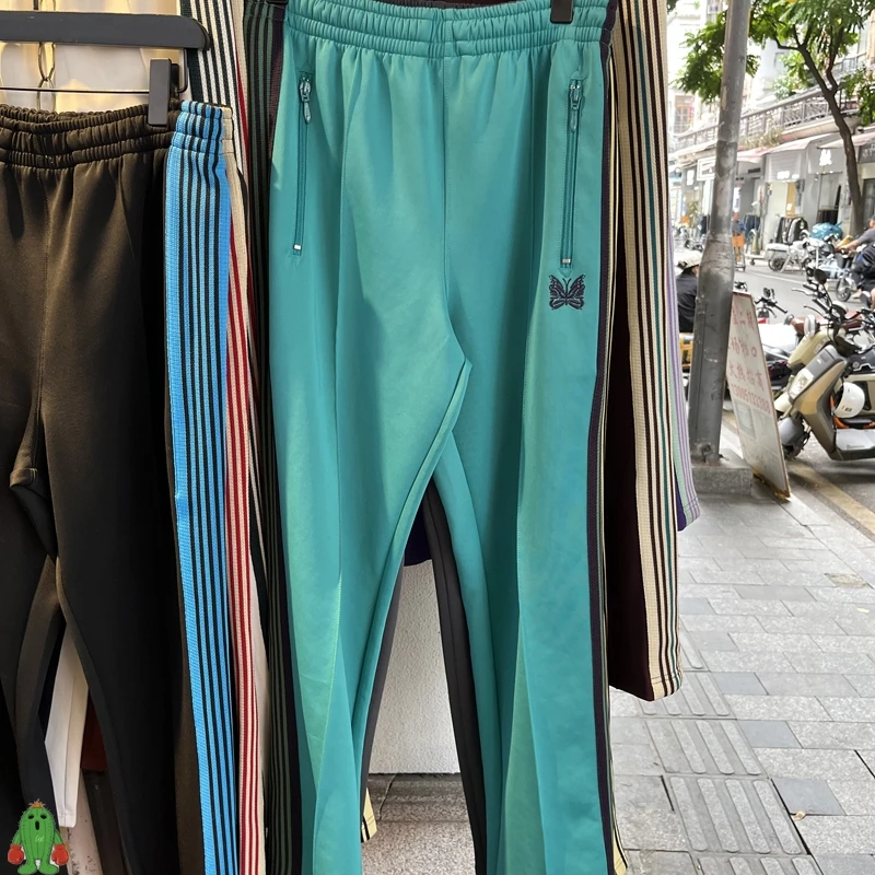 

Needles Trousers Men Women High Quality Butterfly Embroidery Zipper Pocket Sweatpants Side Webbing AWGE Pants