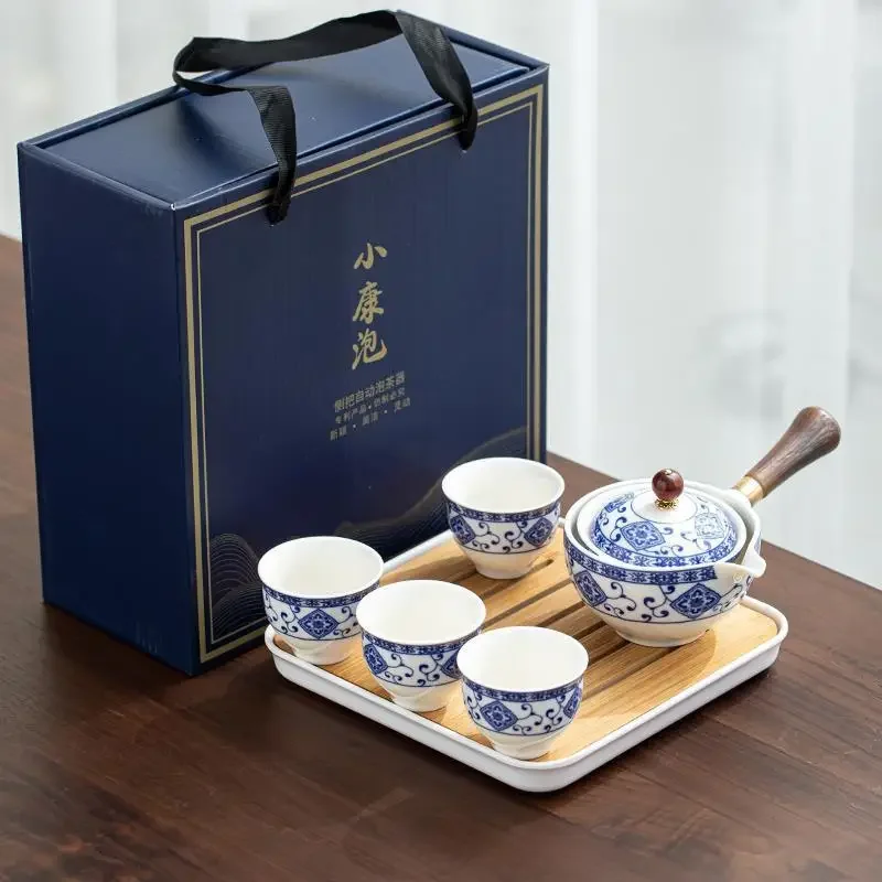 

Фарфоровый китайский чайный набор Gongfu, портативный чайный набор с вращающимся на 360 градусов чайником и инфузером, все в одном, Подарочный пакет, идеальный чай