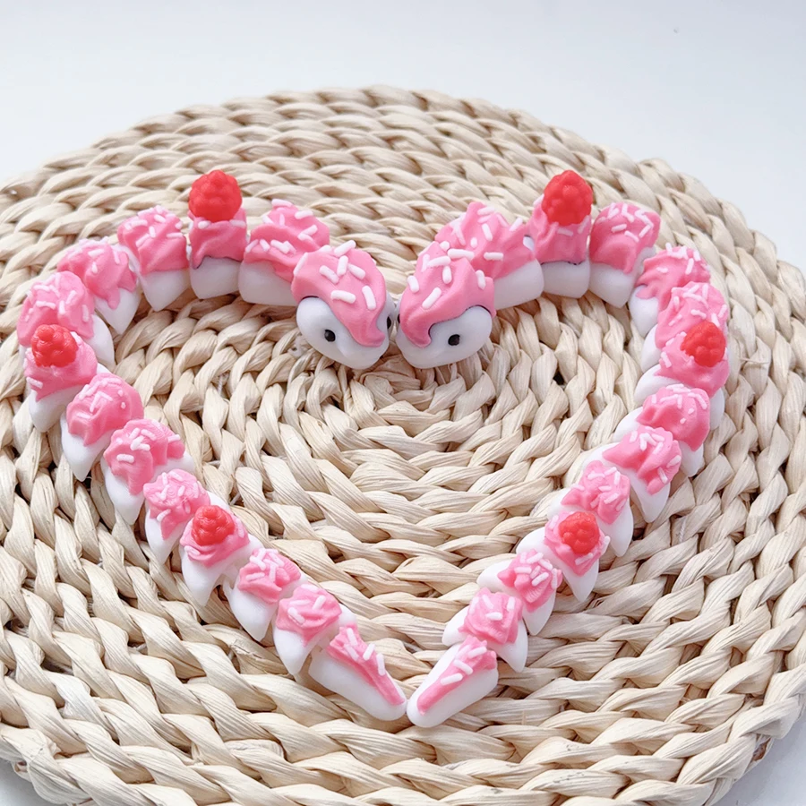 Serpente Dessert Snodabile 3D - serpentino dei dolci rosa con zuccherini e lamponi 9 Serpente Dessert Snodabile 3D - serpentino dei dolci rosa con zuccherini e lamponi - immagine 5