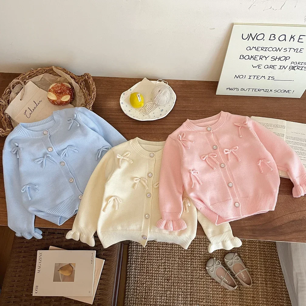 Ropa para niños 2024 Otoño e Invierno nuevo artículo niñas cárdigan de punto con lazo suéter chaqueta lindo bebé dulce Top moda - Imagen 3