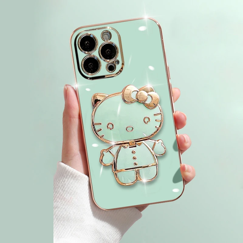 thumbnail image 1 of Funda de lujo con soporte de espejo de Hello Kitty para iPhone 14, 11 Pro Max, 13, 12 Mini, XS, XR, X, 8, 7, 6S, 6 Plus, cubierta trasera de silicona suave, 1 of 5