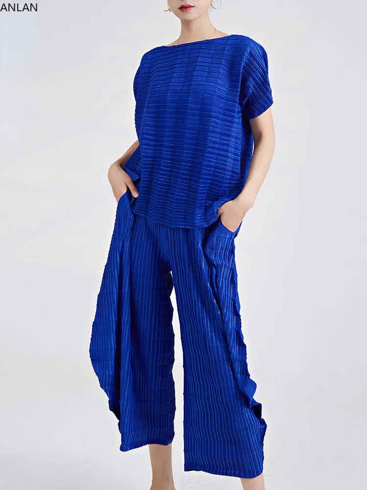 

Irregular Miyake Pleated Set O-Neek Short Sleeves Solid Tops and Casual High Waist Wide Leg Trousers 2 Pieces Sets Summer New