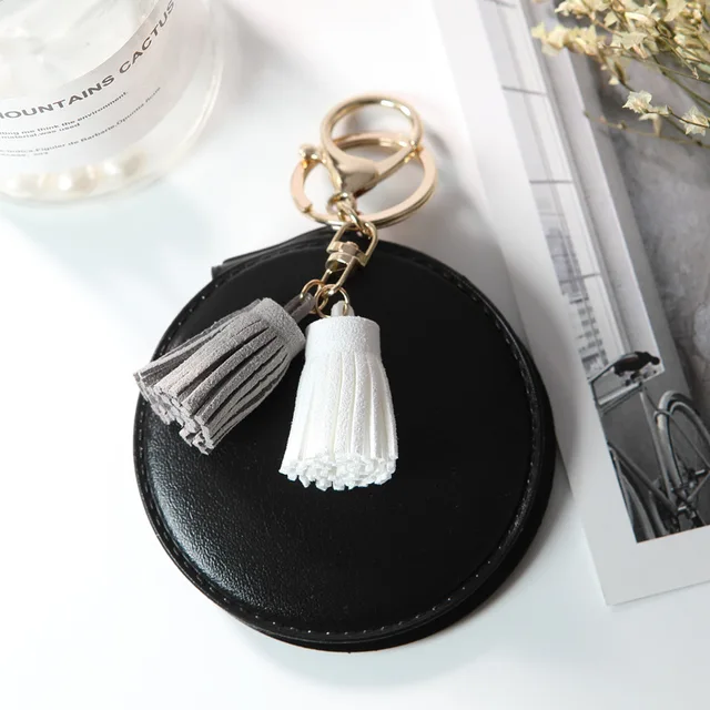 Mini Round PU Leather Small Mirror with Lovely Tassel: A Portable Cosmetic Mirror Keychain