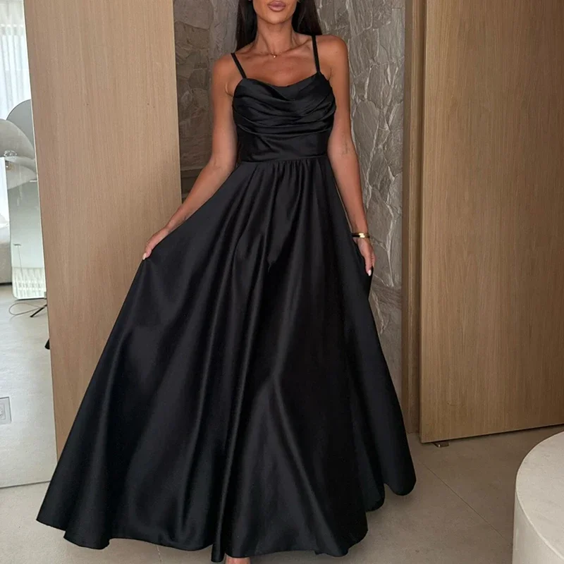 Elegant women’s backless off-shoulder long evening swing dress in solid color black