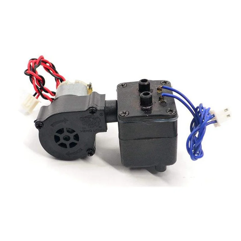 Vue rapprochée du générateur de fumée 6V pour tank RC, montrant le réservoir et la sortie de vapeur.