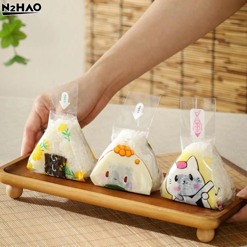 100Pcs 스시 가방 사랑스러운 일본식 삼각형 쌀 공 일회용 포장 가방 스시 만들기 금형 도시락 액세서리