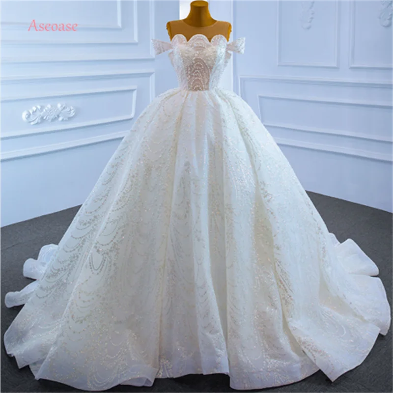 

Aseoase Real Photo Wedding Dresses Ball Gown Off The Shoulder Tulle Pearls Puffy Dubai Arabic Wedding Gown Bridal Dresses