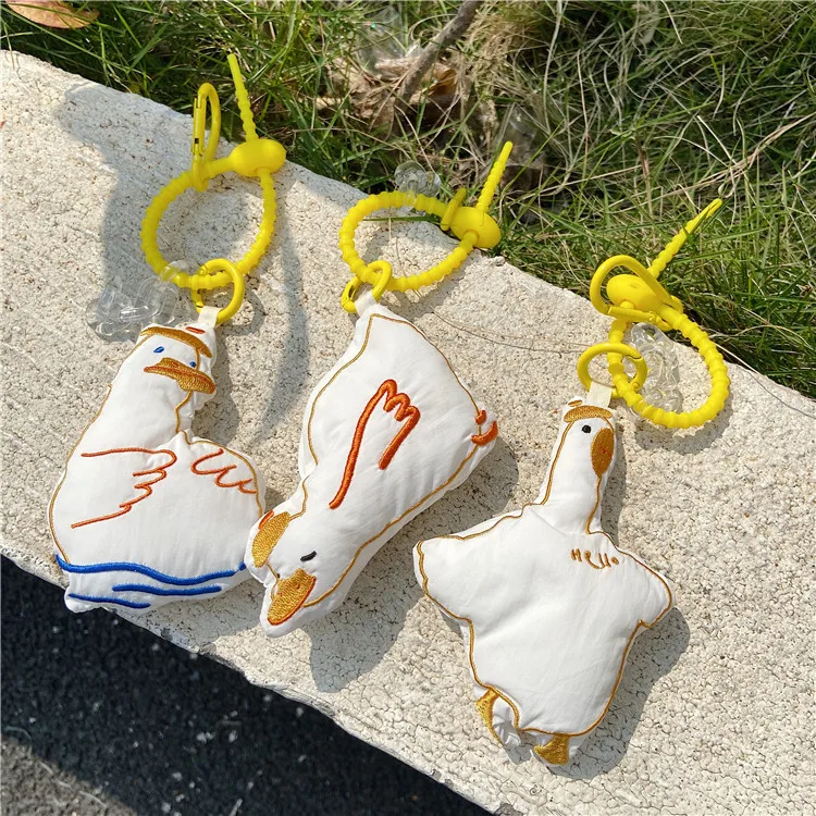 

Duck Luggage Backpack Tote bag Pendant Accessories Duck Keychain Figure Keychains Decor Cute Ducks Doll Toys Kids Party Gifts