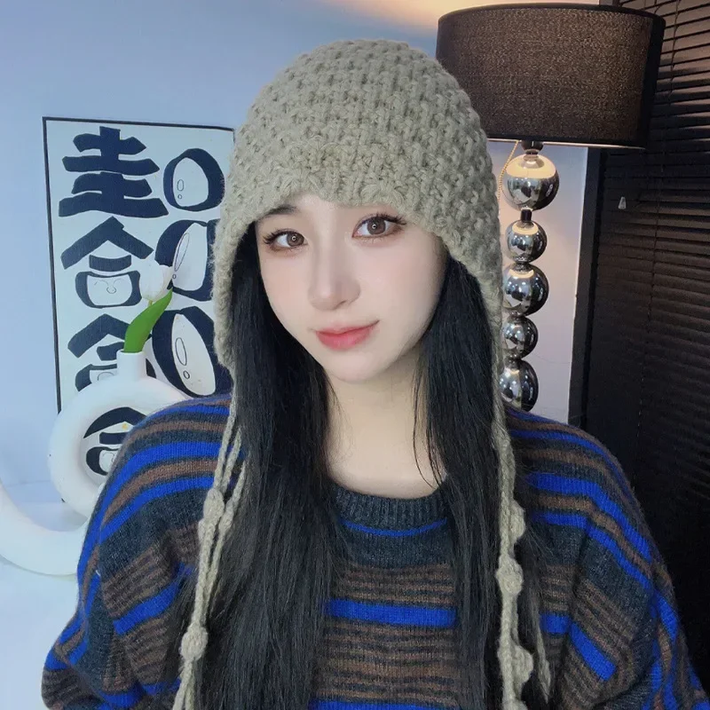 Autumn and Winter Handmade Fashion Tassel Thickened Warm Wrapped Head Cap Female Ear Protection Strapped Cap Knitted Wool Hat