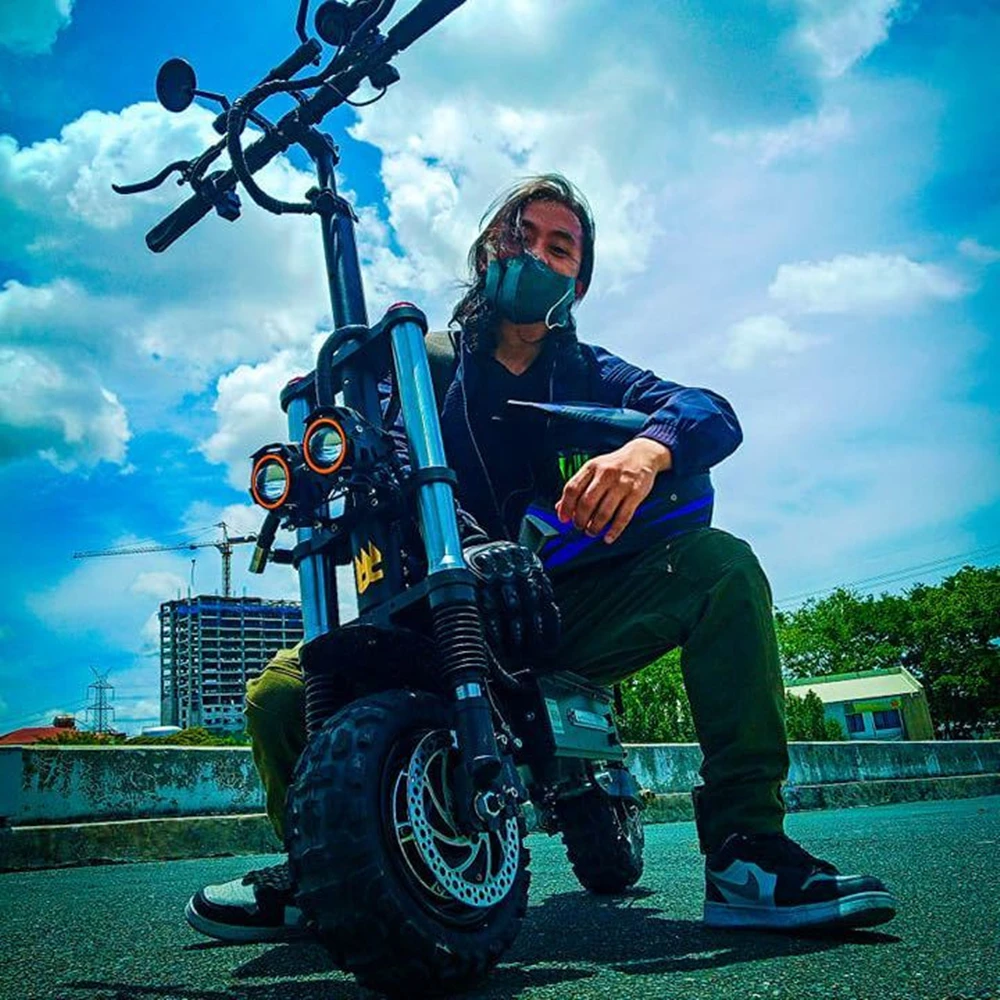 

Off Road Dual Motor Electric Scooter Adult with Seat 11" Folding E-Scooter 55+MPH 5600W60V Long Range Waterproof