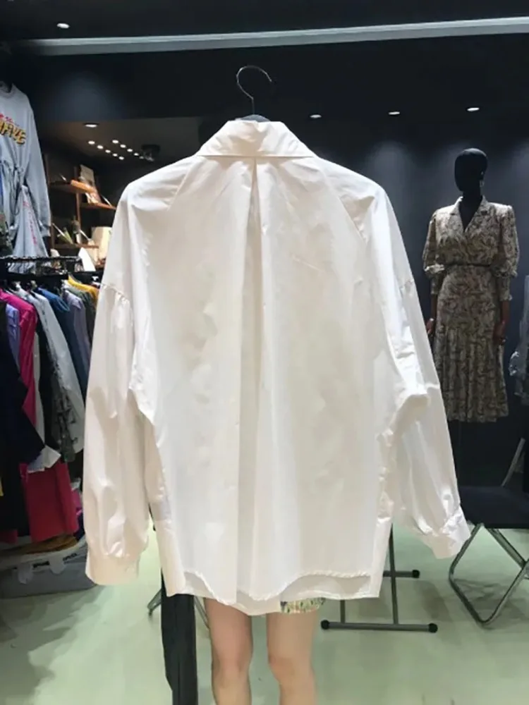รูปสินค้า เสื้อเชิ้ตแขนยาวแฟชั่น กระดุมใหญ่ ดีไซน์เรโทร สำหรับสาวๆ