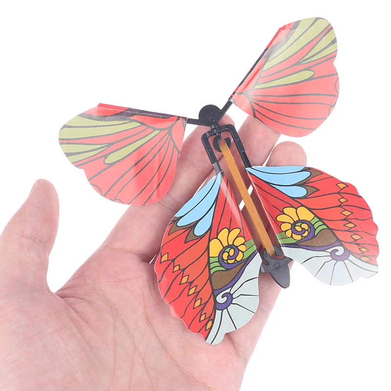 

10PCS/SET Magic Wind Up Flying Butterfly Surprise Box Explosion Box in The Book Rubber Band Powered Magic Fairy Flying Toy Gift