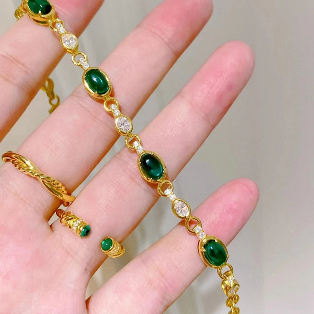 18Kt Yellow Gold Emerald Bangle Bracelet