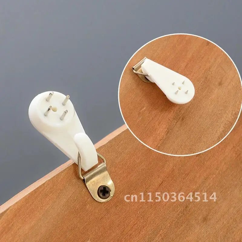 Description Picture 6 of item10pcs Seamless White Plastic Invisible Wall Mount Photo Picture Frame Nail Hook Hanger Hard Picture Frame Wall Hooks Nail