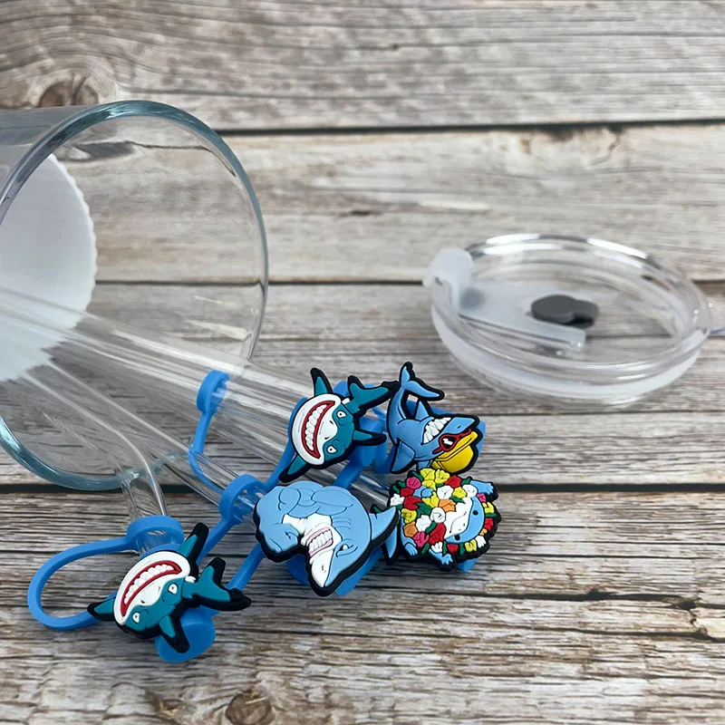 https://ae01.alicdn.com/kf/S213b5c6c9a4947448badf94da50af4628/1PCS-PVC-Straw-Toppers-Cute-Shark-Straw-Cover-Airtight-Dust-Cap-Splash-Proof-Drinking-Plastic-Straw.jpg