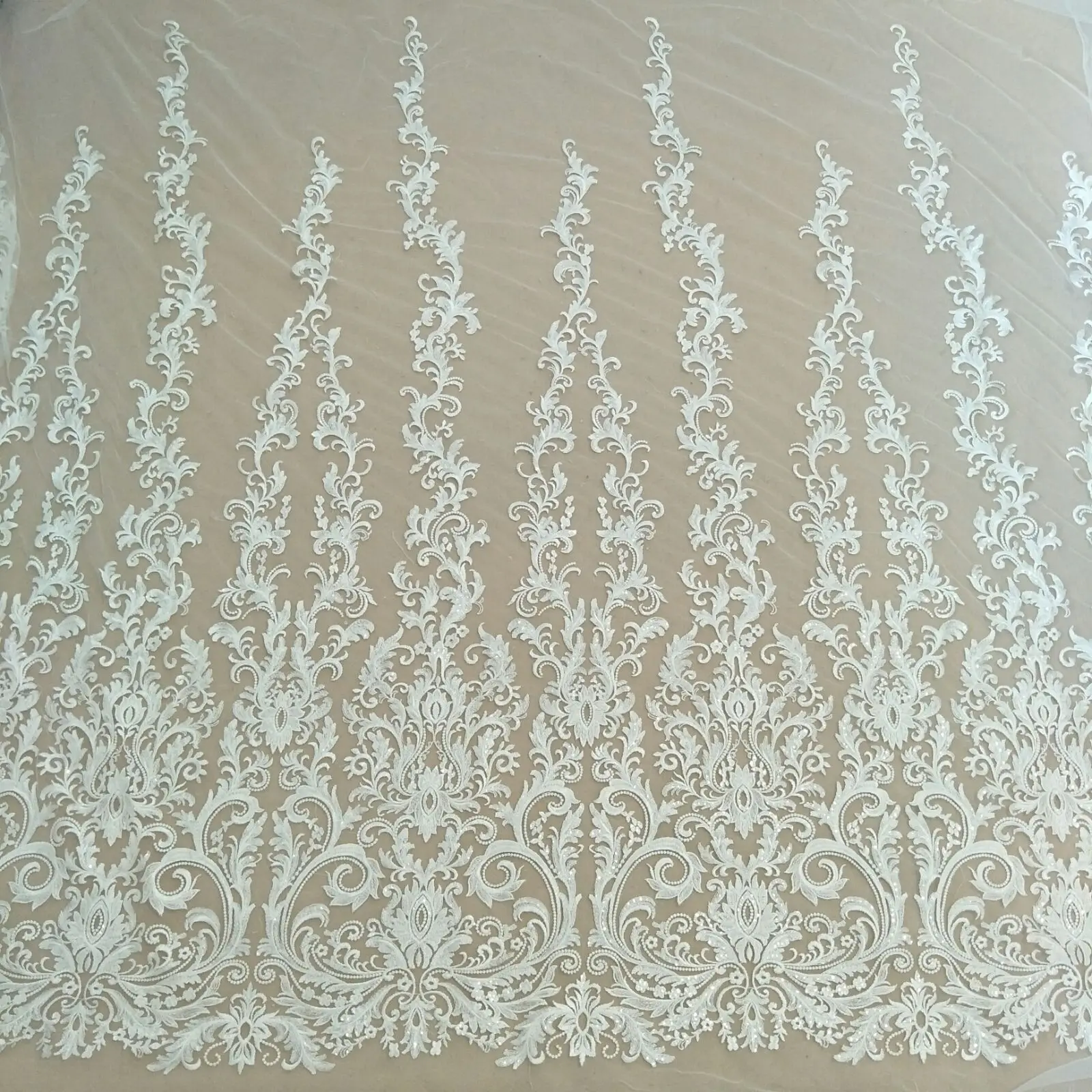 The latest symmetrical diy wedding dress lace with sequins 130cm width sell by yard