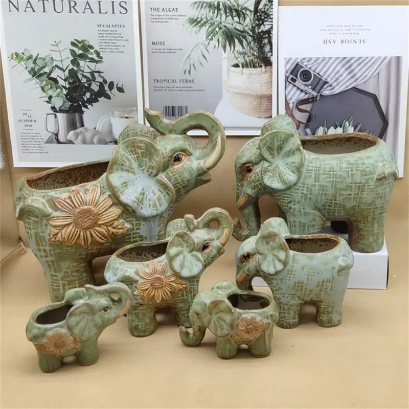 Grande statue d' éléphant porte-plante en céramique pour la maison Grande statue d' éléphant porte-plante en céramique pour la maison