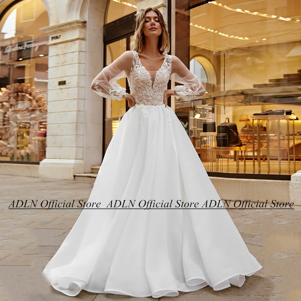 

A Line Organza Wedding Dress Puff Sleeevs V Neck Sequined Applique Illusion Sweep Train Bridal Gown Bride Vestidos De Novia