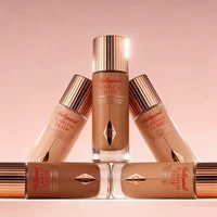 Charlotte Tilbury CT Highlighter Foundation : Poudre compacte hydratante et illuminatrice pour un maquillage longue tenue 5