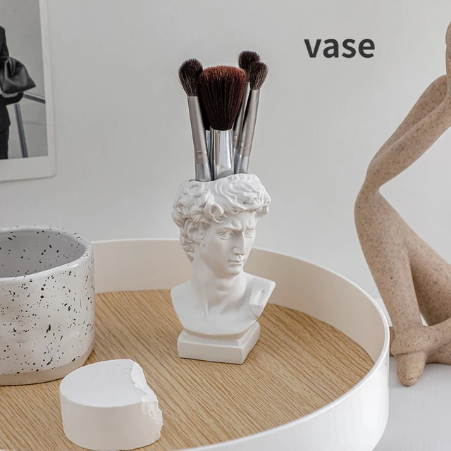 Unleash your creativity with the Epoxy Resin Silicone Mold David Head Vase Silicone Molds Pot Gypsum Mold Pen Holder Flowerpot Vase Potted Clay Moulds.