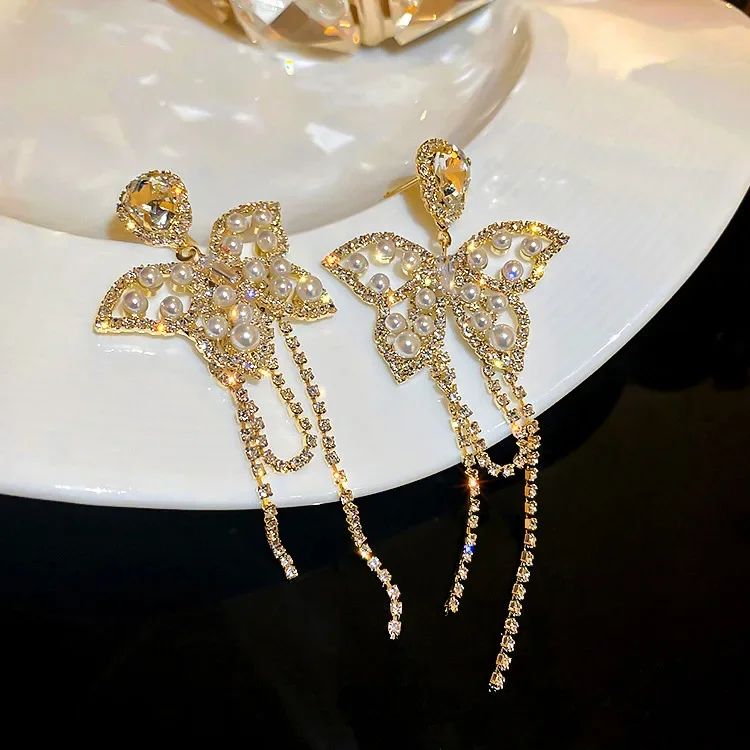 

Pearl Bowknot Tassel Earrings Long Style Net Red Wholesale Fashion Earringes Female