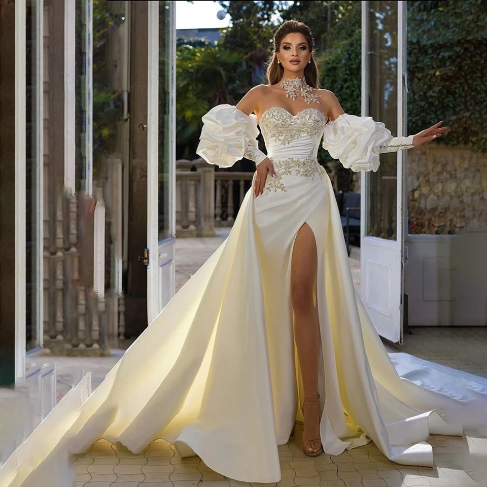 Wunderschöne Brautkleider aus Satin mit Spitzenapplikationen, Puffärmeln, hohem Schlitz, Meerjungfrauen-Schnitt, rückenfrei und Hofschleppe für Damen 2026 – Detail 4