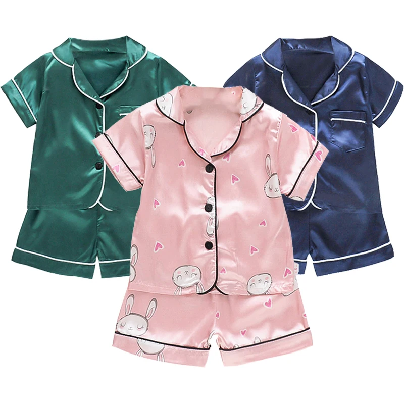 Neuer Kinder pyjama 0-5 Jahre alter Baby-Cartoon-Kurzarm-Pyjama mit bequemer einfarbiger Wohn kleidung aus Eisse ide