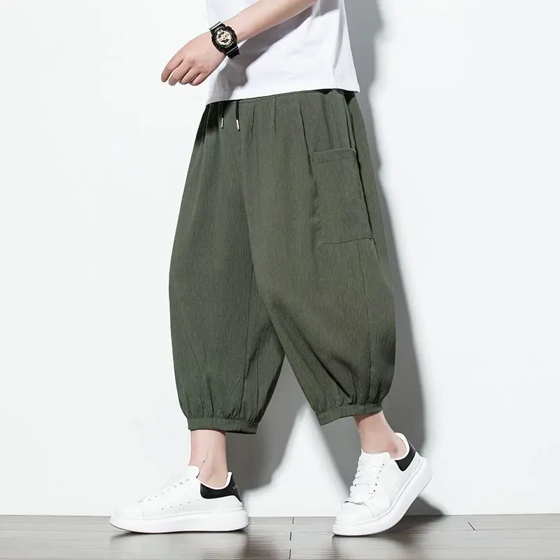 Fashion Elastic Lace Up Solid Color Pockets Harem Casual Pants Men's Clothing 2024 Spring Summer New Loose Korean Cropped Pants