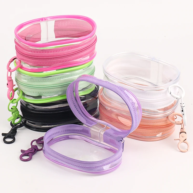 Multi-functional Portable Clear Cosmetics Storage Bag Space Saving Organizer Earphones Chargers Powder Puff Mini Keychain Loop 2