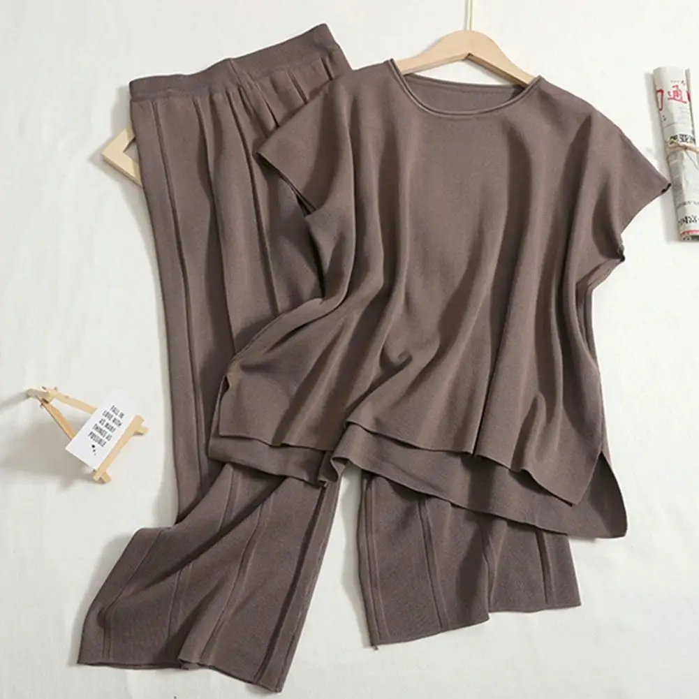 

Regular Fit Women Tracksuit Stylish Women's Summer Set Sleeveless Round Neck Top with Wide Leg Pants Irregular Hem Solid Color