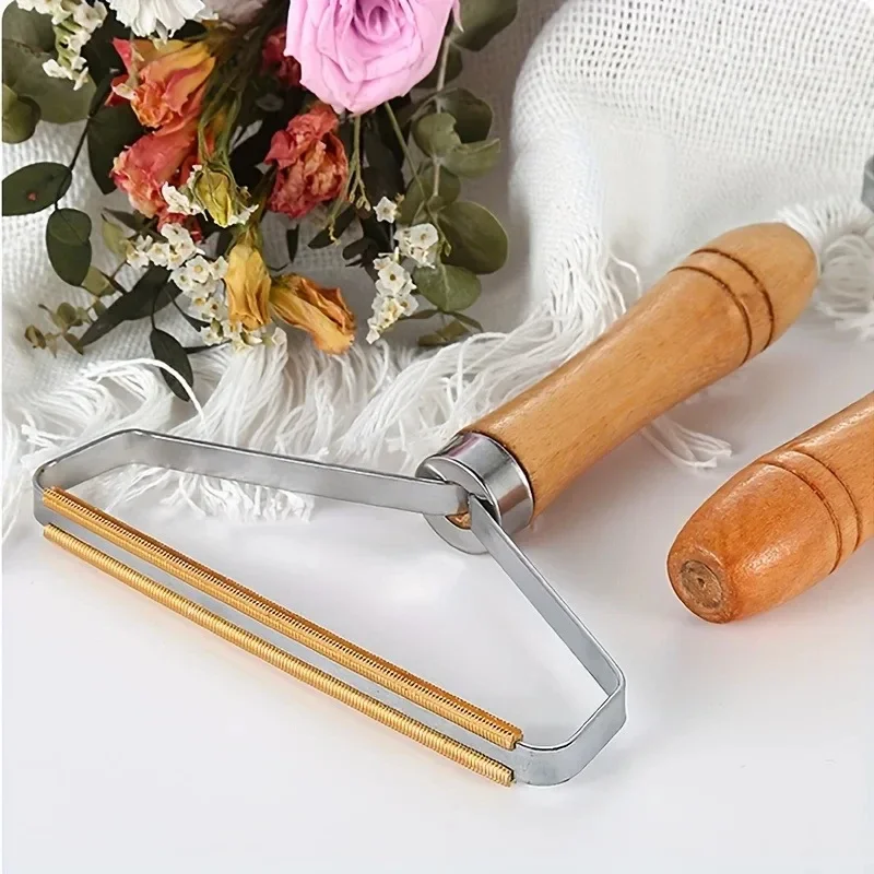 Pet hair remover with wooden handle