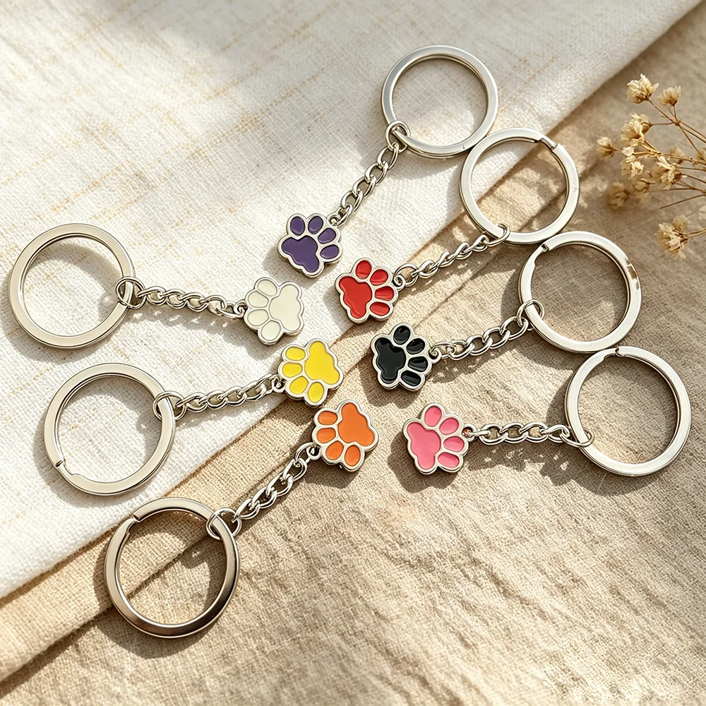 7-teiliges Set Bunte Katzenpfoten-Schlüsselanhänger aus Zinklegierung mit Emaille-Tierpfoten-Anhänger als Taschenanhänger und Geschenk