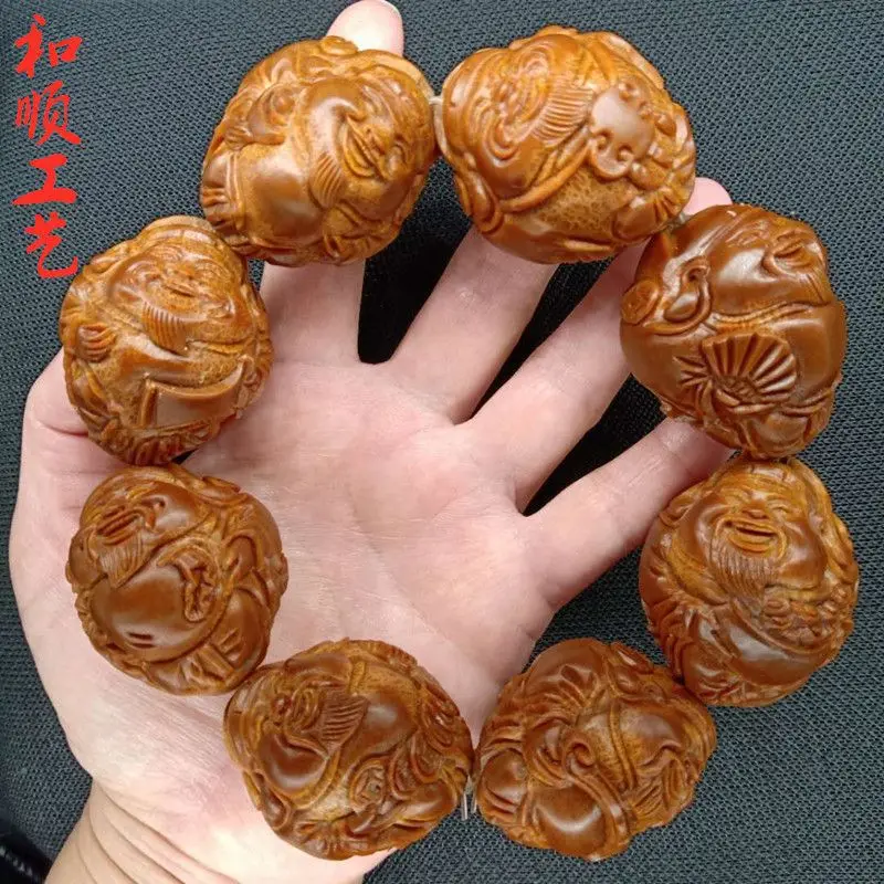 

Super Large Imported Brazil Indonesia Giant Handmade Eight Mammon Hand-Held Crafts Carved Olive Nut