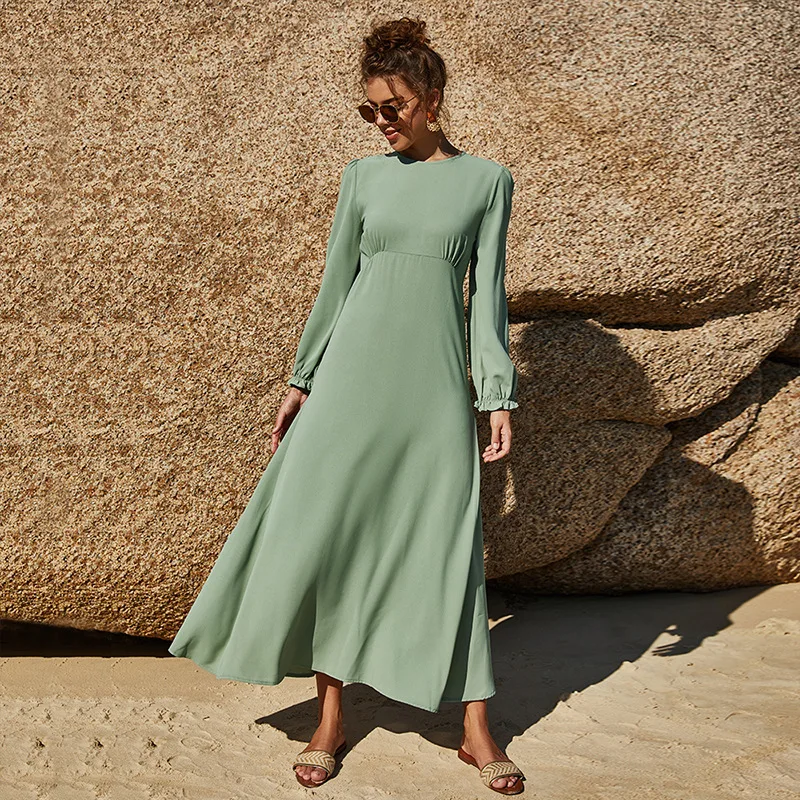 Flat lay of modest clothing Islamic dress set in cream and sea green options