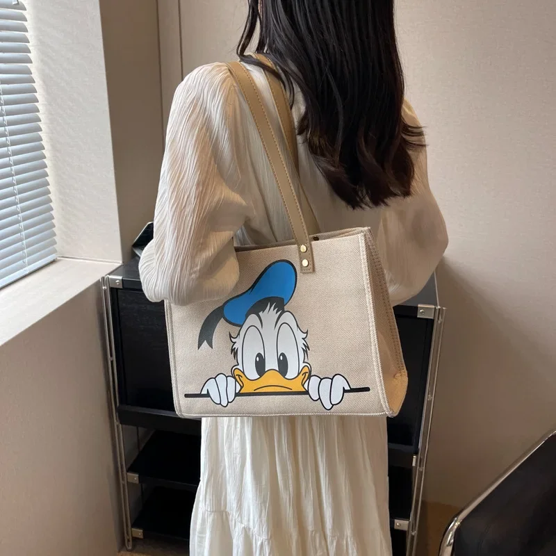 Disney's New Canvas Bag Women Fashion Cartoon Mickey Mouse Donald Duck Mommy Carry Bag Student Shoulder Commuter Tote Bag