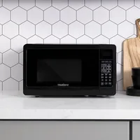 OUIO Microwave oven 700W compact with 6 pre-cooking settings, fast defrost, electronic control panel and glass turntable 1
